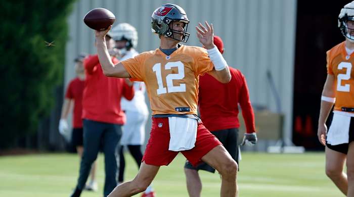 Jul 27, 2022; Tampa, FL, USA; Tampa Bay Buccaneers quarterback Tom Brady (12) works out during training camp at Advent Health Training Complex.